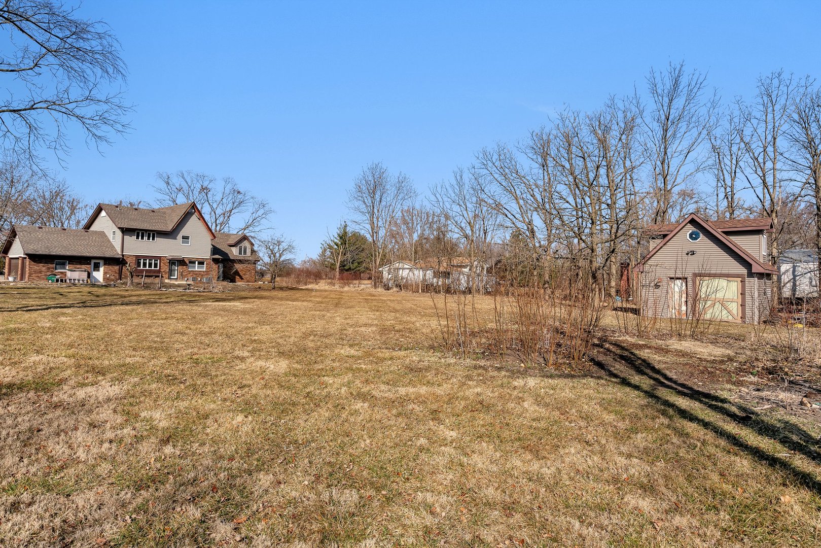 13070 McKanna Road Minooka, IL 60447 - Photo 42 of 43 a view of outdoor space with trees