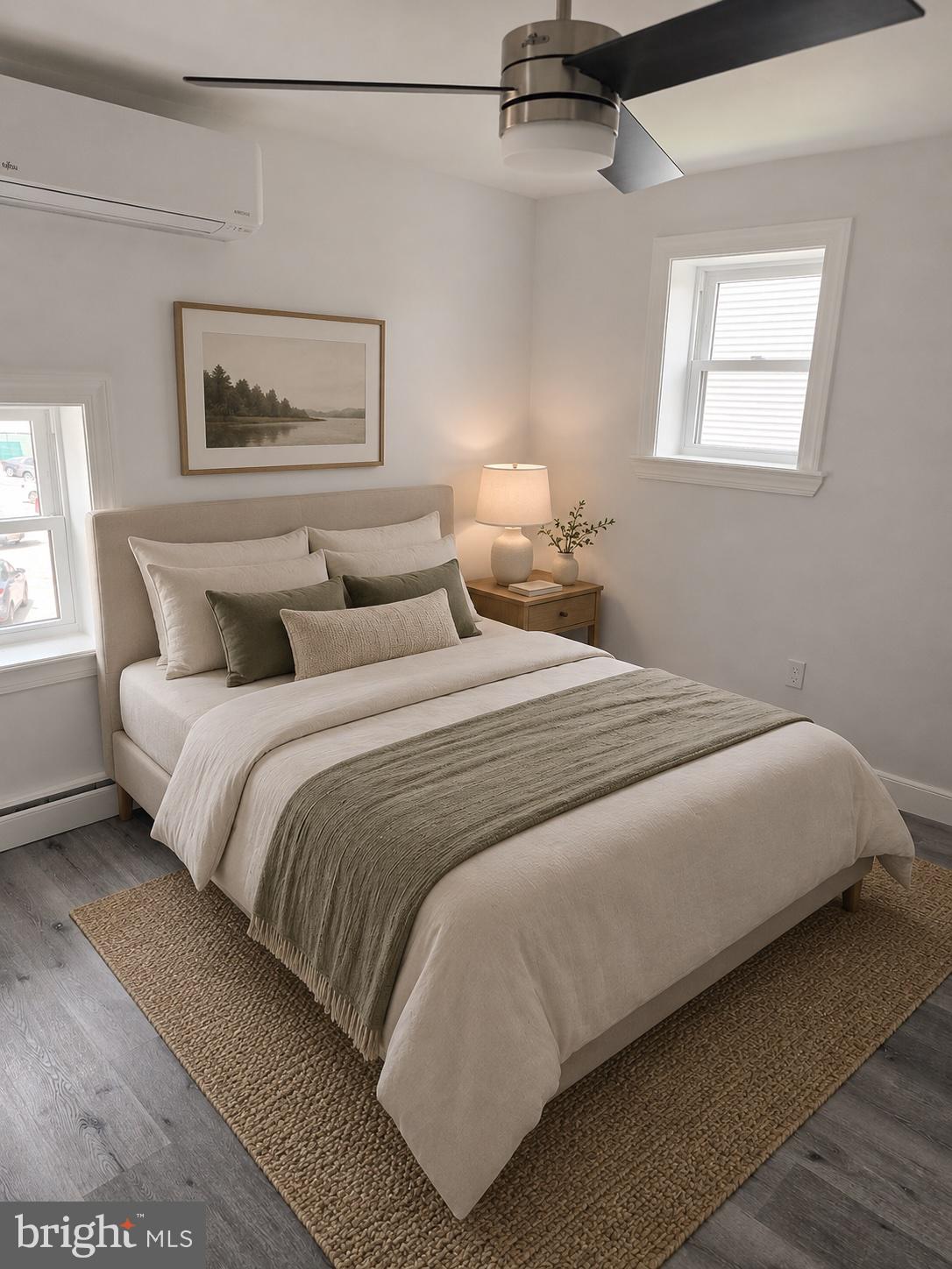 5925 Ridge Avenue, Unit 5 Philadelphia, PA 19128 - Photo 9 of 31 a bedroom with a bed and a window