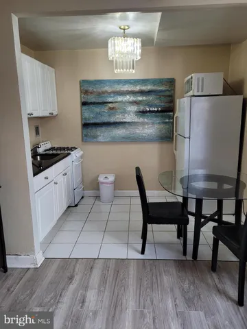 a room with furniture and flat screen tv