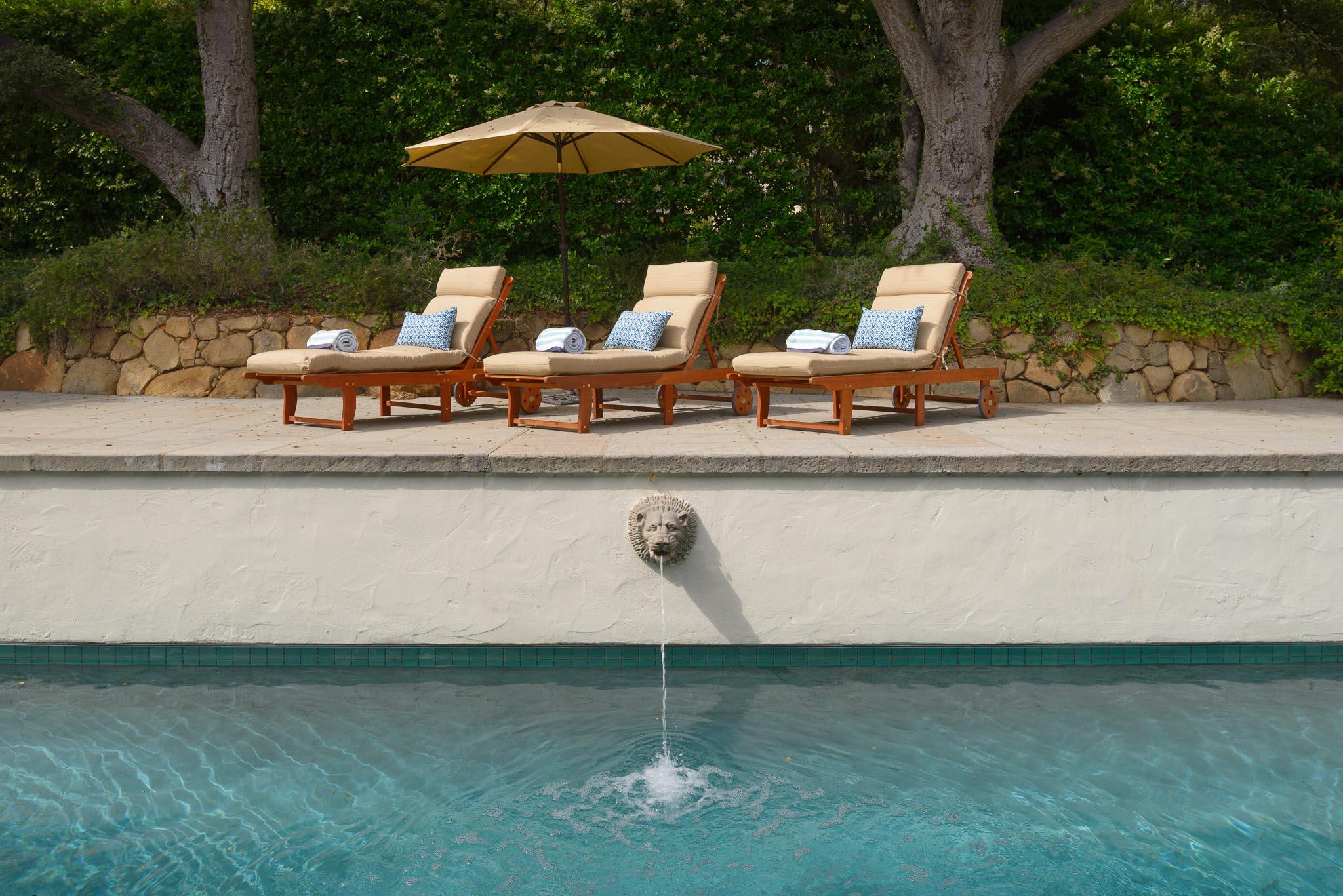 720 El Bosque Road Santa Barbara, CA 93108 - Photo 15 of 21 a view of a table and chairs under an umbrella