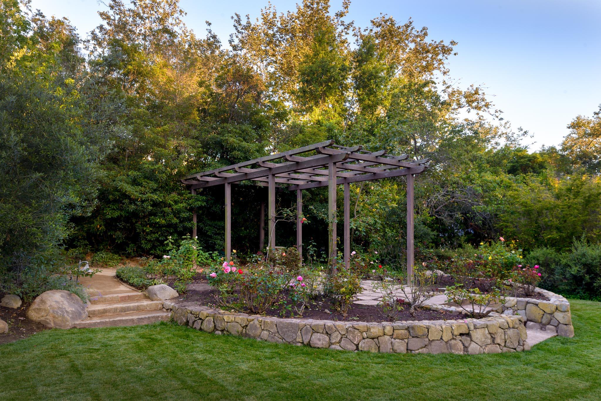 720 El Bosque Road Santa Barbara, CA 93108 - Photo 20 of 21 a front view of house with a garden and patio