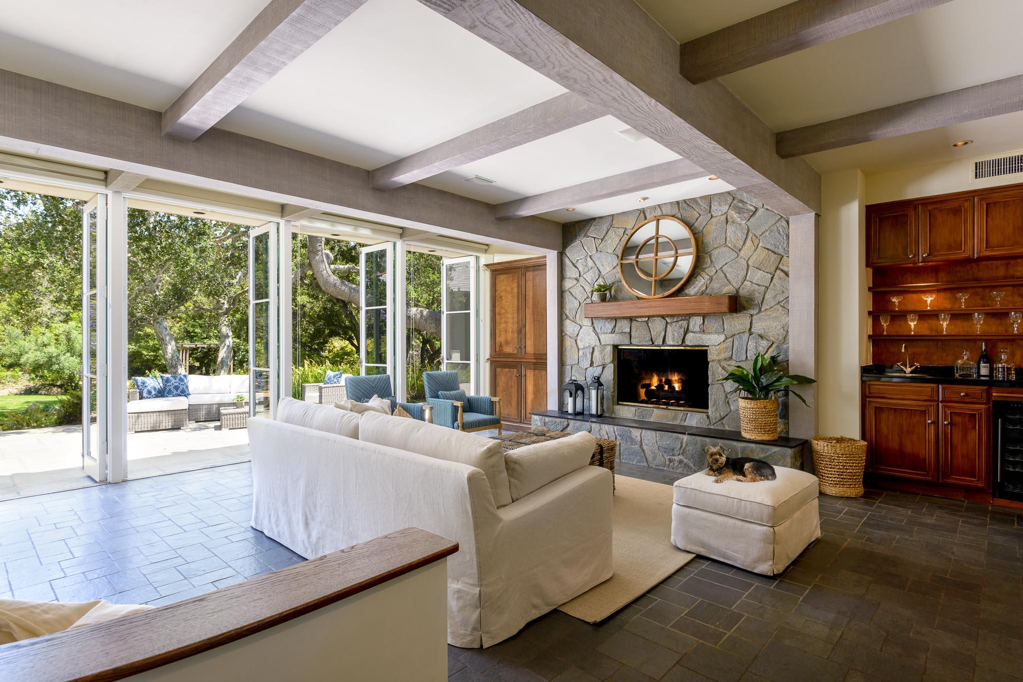 720 El Bosque Road Santa Barbara, CA 93108 - Photo 3 of 21 a living room with fireplace furniture and a large window