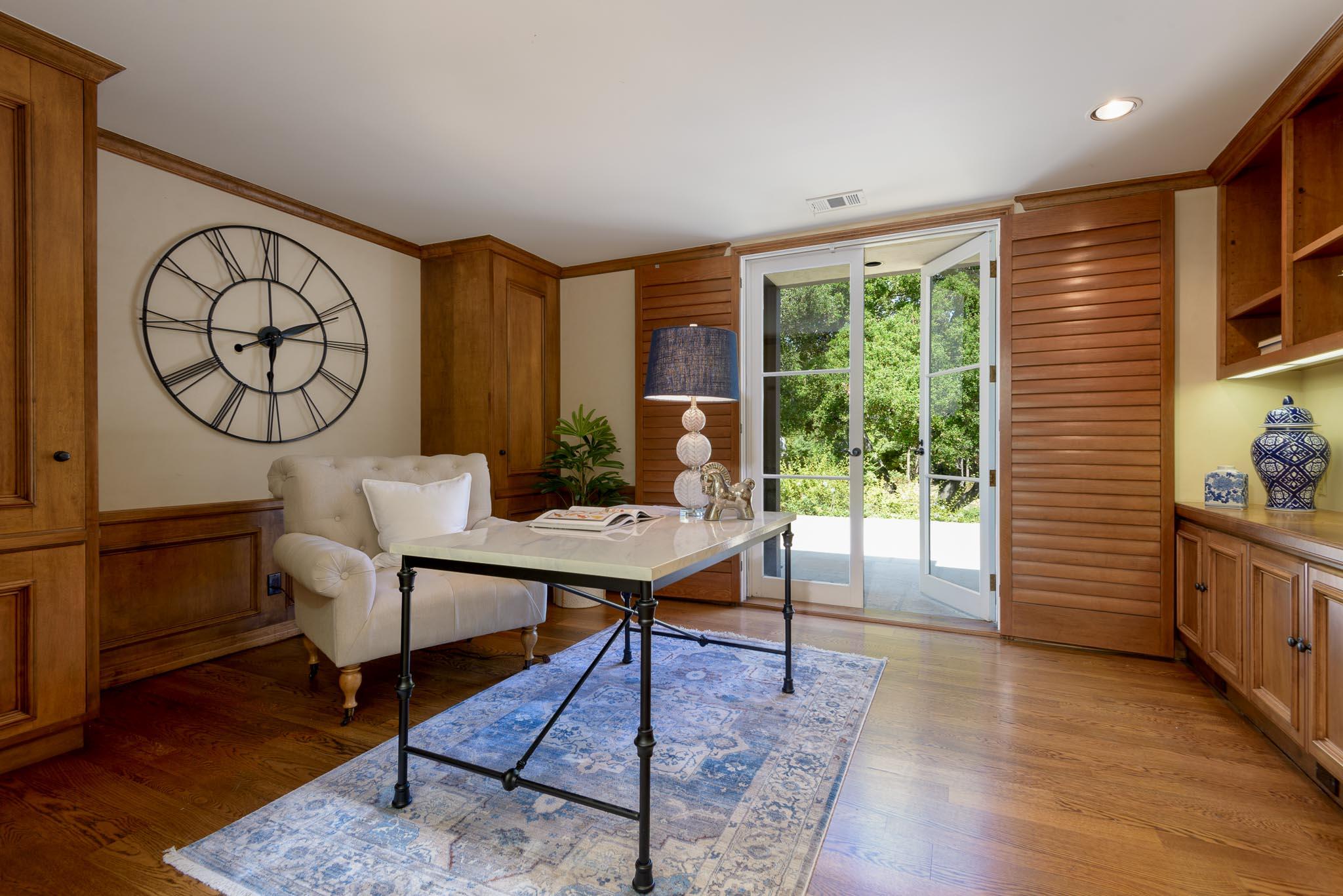 720 El Bosque Road Santa Barbara, CA 93108 - Photo 10 of 21 a living room with furniture a table and a large window