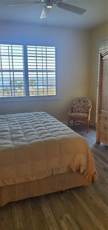 13413 Gasparilla Road, Unit 304 Placida, FL 33946 - Photo 11 of 28 a bedroom with a bed and a window