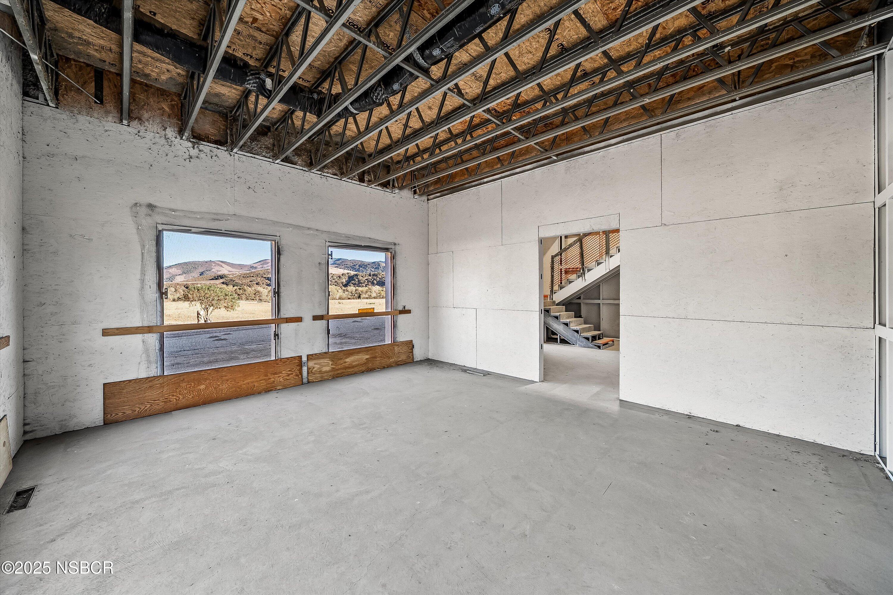 4375 Sweeney Road Lompoc, CA 93436 - Photo 23 of 70 a view of an empty room with a fireplace