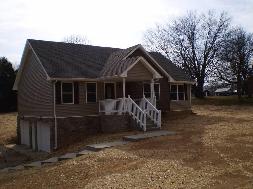 5189 Marion Road Cunningham, TN 37052 - Photo 1 of 7 a view of a house with a yard