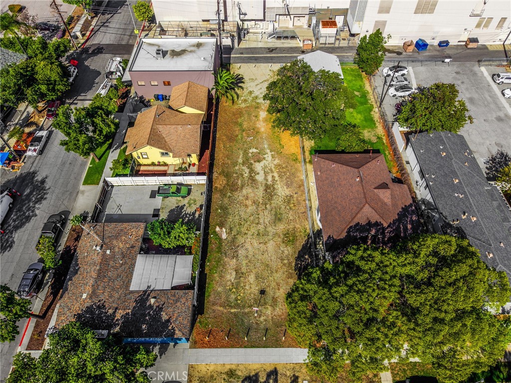 220 West C Street Ontario, CA 91762 - Photo 15 of 22 an aerial view of a house with a yard and lake view