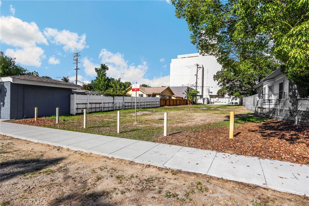 220 West C Street Ontario, CA 91762 - Photo 6 of 22 a view of a house with backyard and sitting area