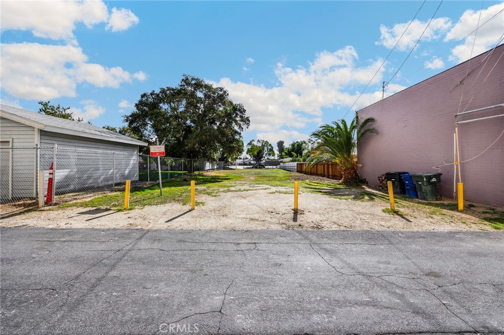 220 West C Street Ontario, CA 91762 - Photo 8 of 22 a view of a house with a yard and sitting area