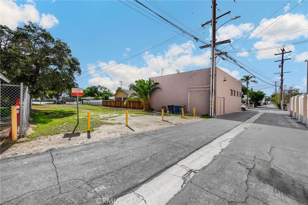 220 West C Street Ontario, CA 91762 - Photo 10 of 22 a view of a house with a patio and a yard