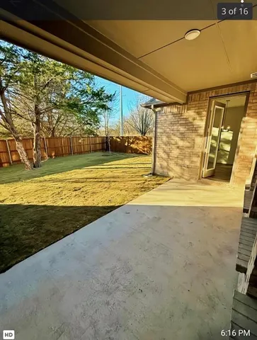 a view of an empty room and a yard