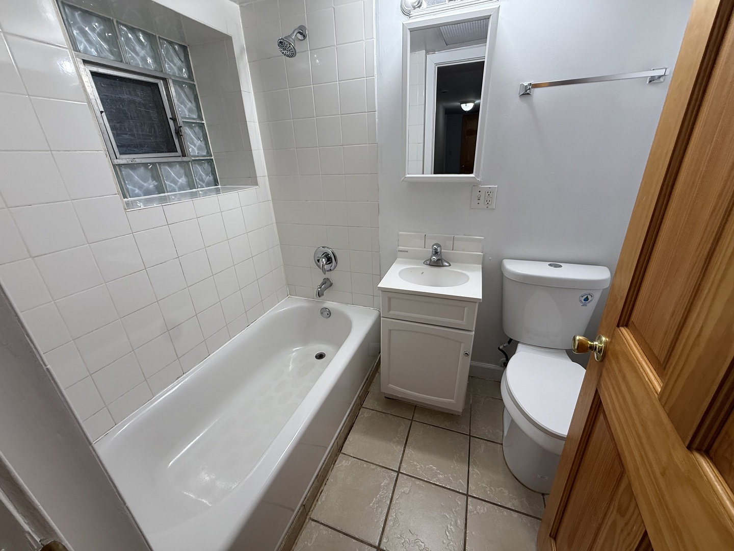 102 Lincoln Avenue, Unit GDN Riverside, IL 60546 - Photo 12 of 12 a bathroom with a toilet sink and mirror