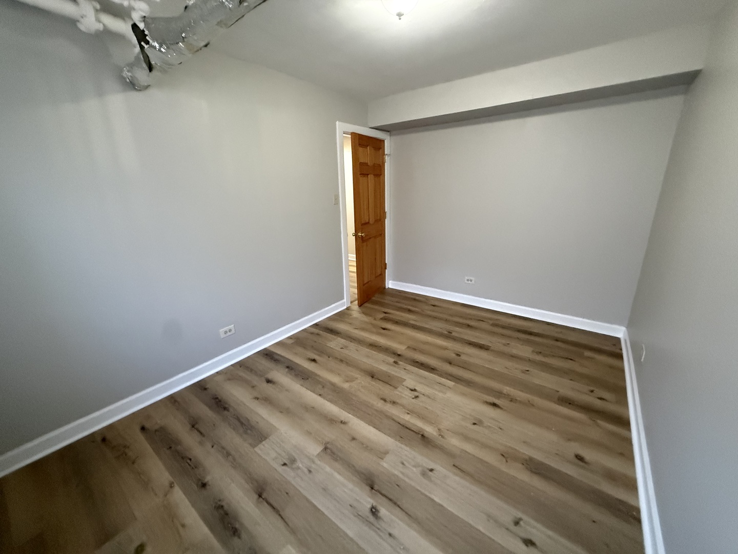 102 Lincoln Avenue, Unit GDN Riverside, IL 60546 - Photo 5 of 12 a view of room with empty racks