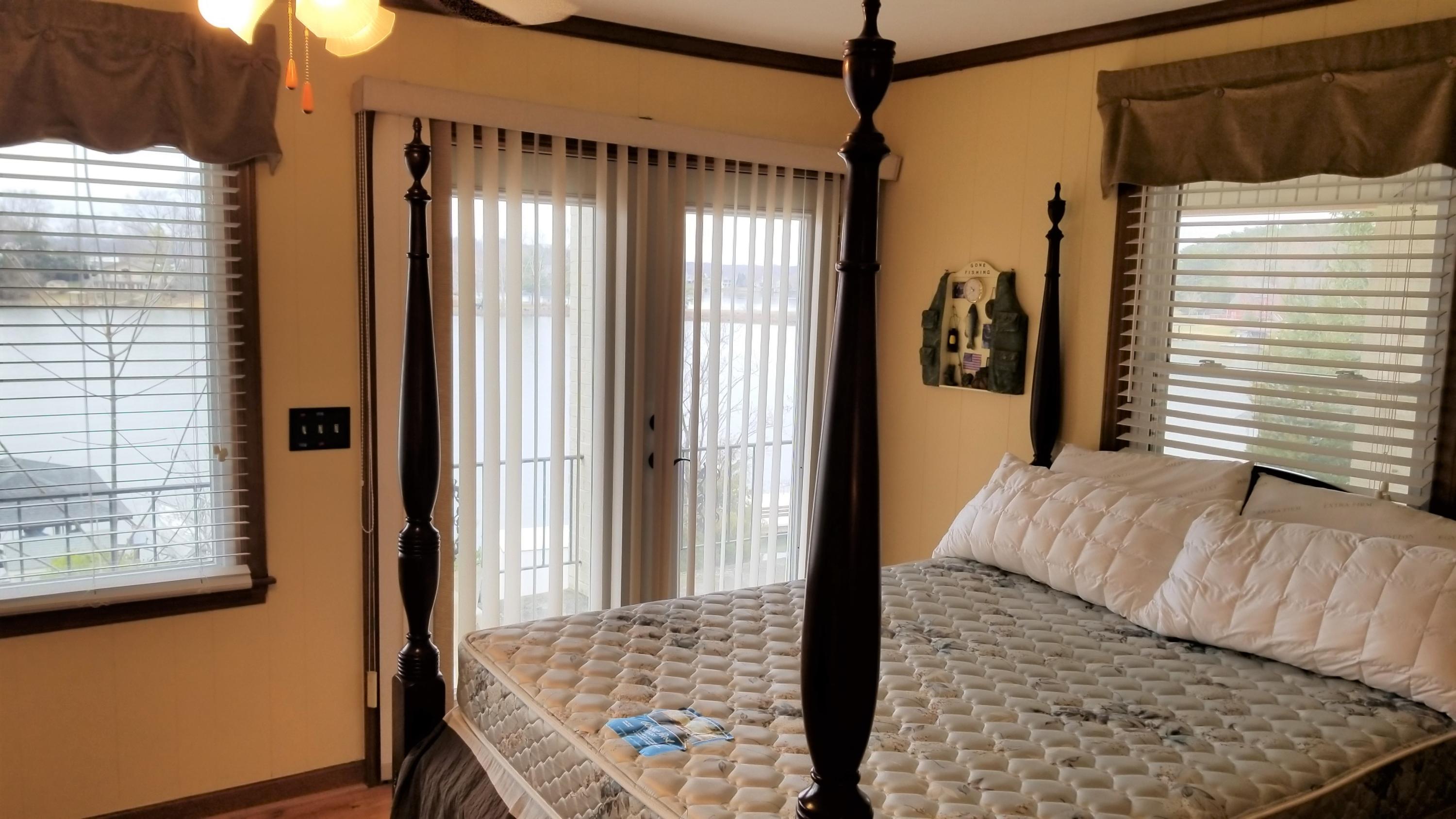 541 Highland Lake Road Union Hall, VA 24176 - Photo 15 of 37 a bedroom with a bed and a window
