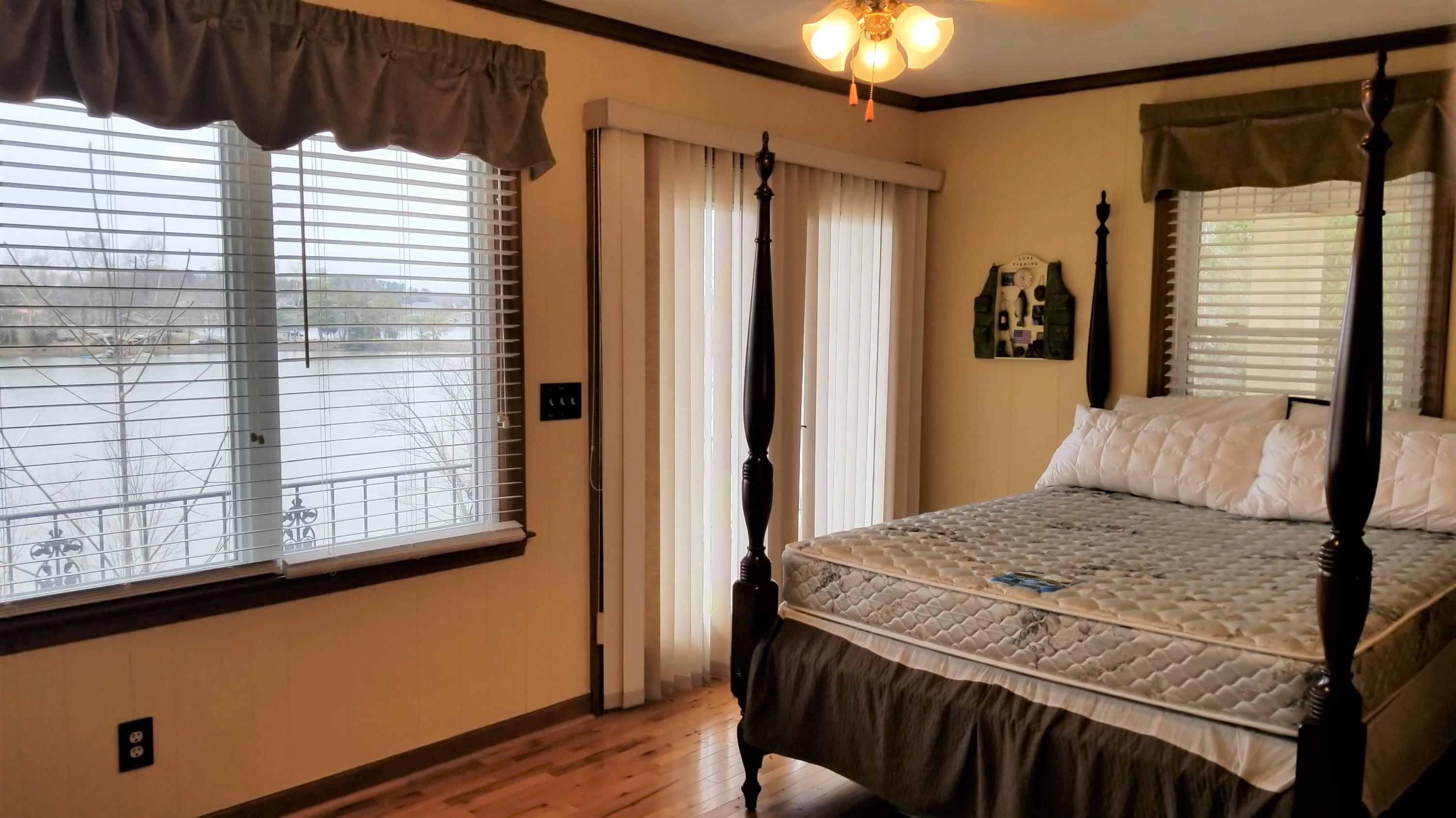541 Highland Lake Road Union Hall, VA 24176 - Photo 16 of 37 a bedroom with a bed and a window