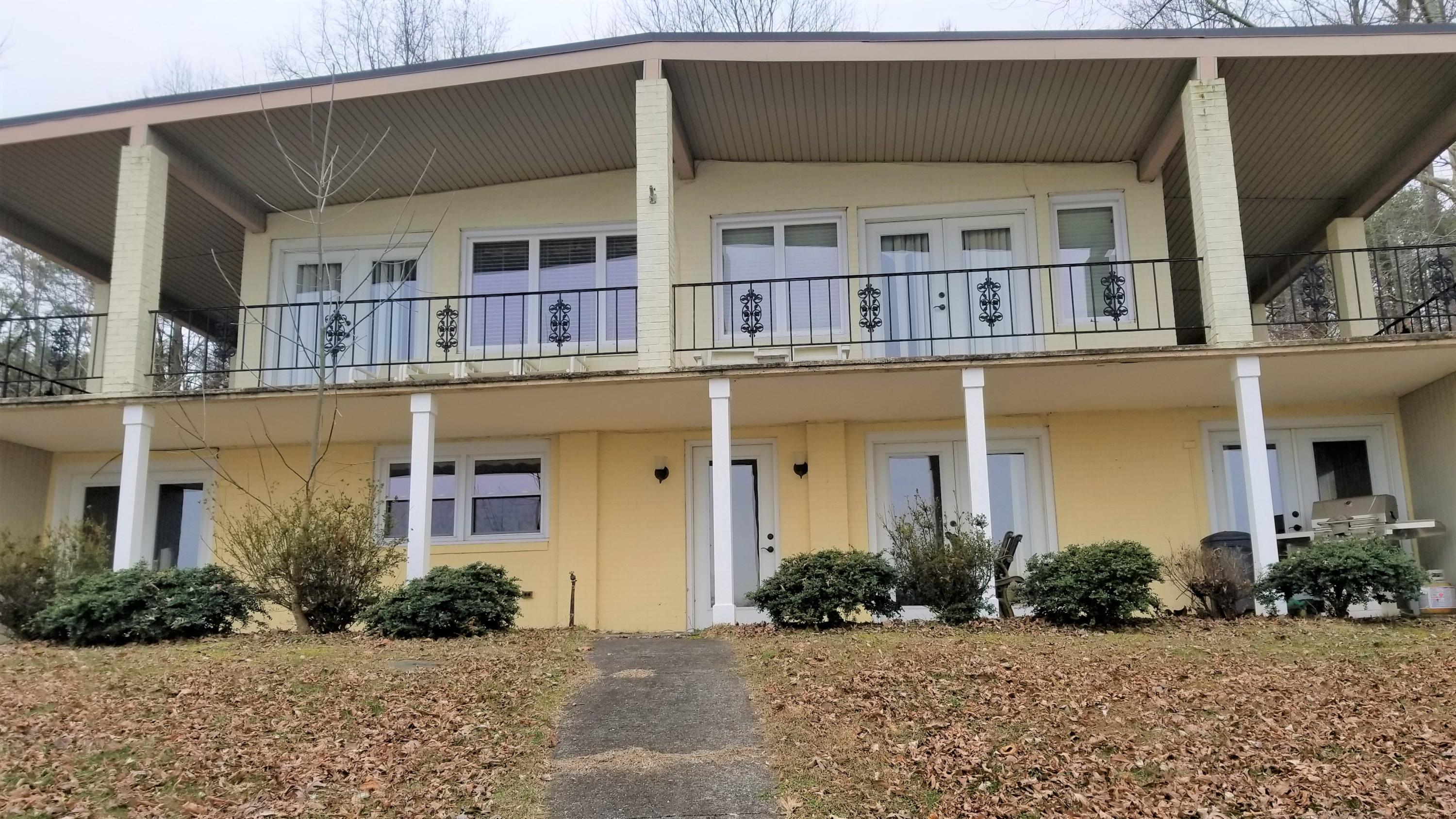 541 Highland Lake Road Union Hall, VA 24176 - Photo 22 of 37 a front view of a building with a garden