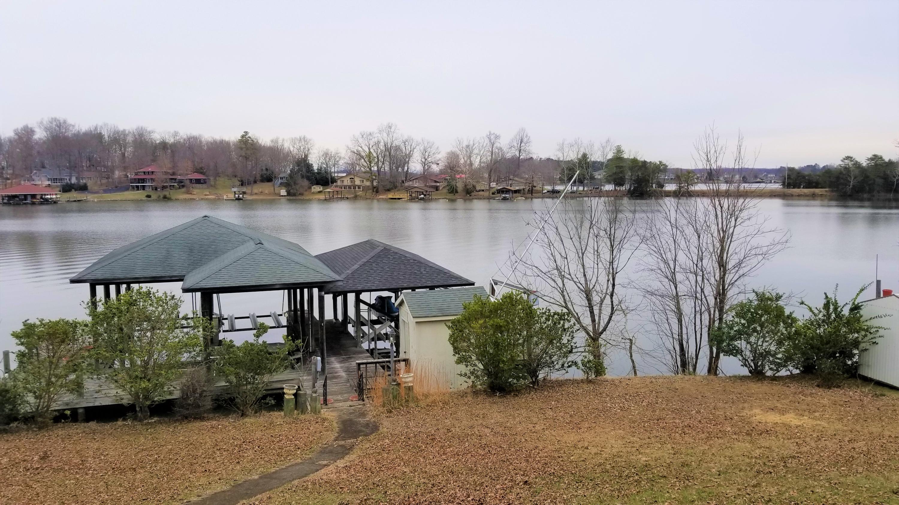 541 Highland Lake Road Union Hall, VA 24176 - Photo 28 of 37 a view of a lake with sitting area and lake view