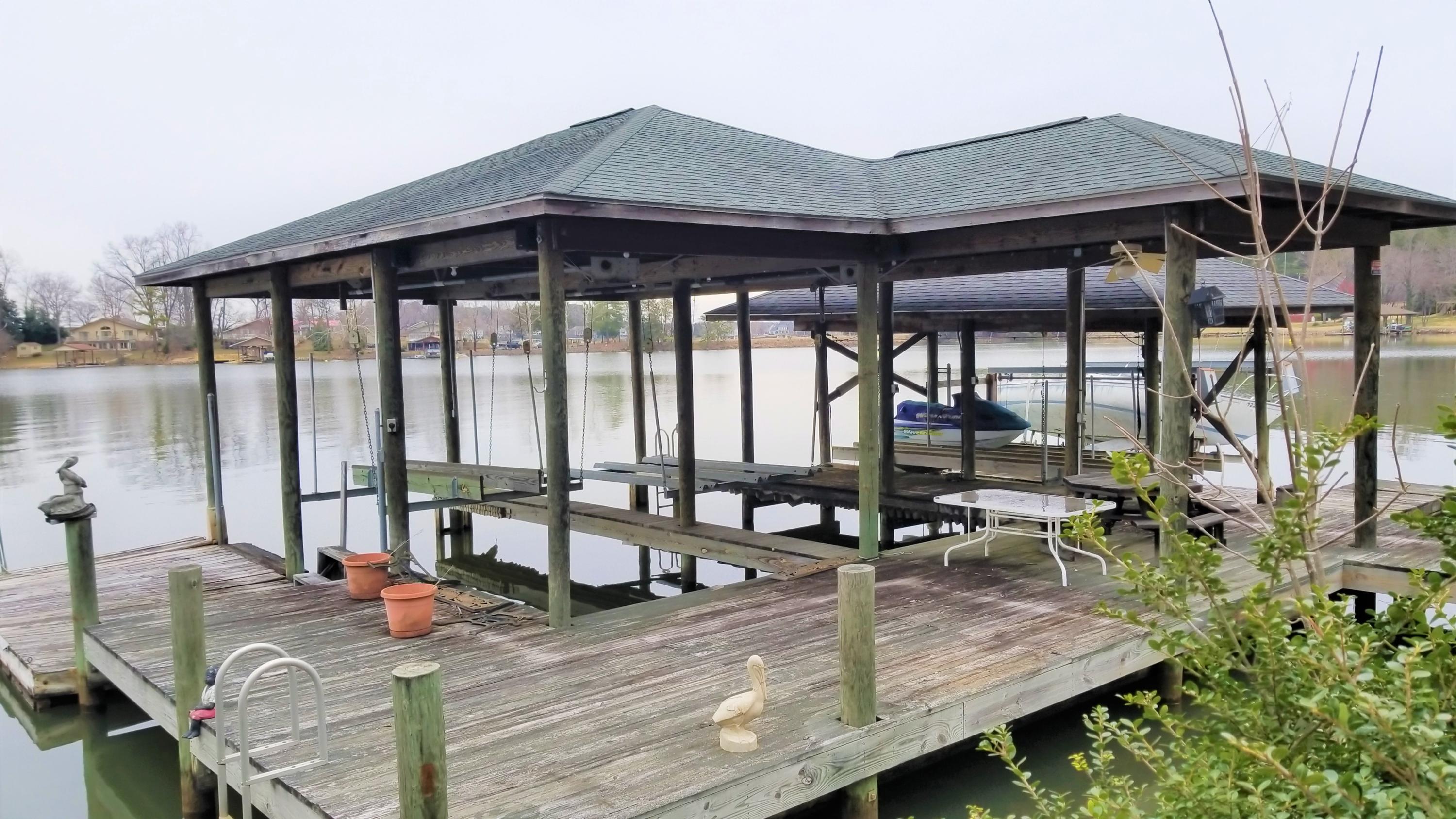 541 Highland Lake Road Union Hall, VA 24176 - Photo 29 of 37 a view of a swimming pool with chairs in patio