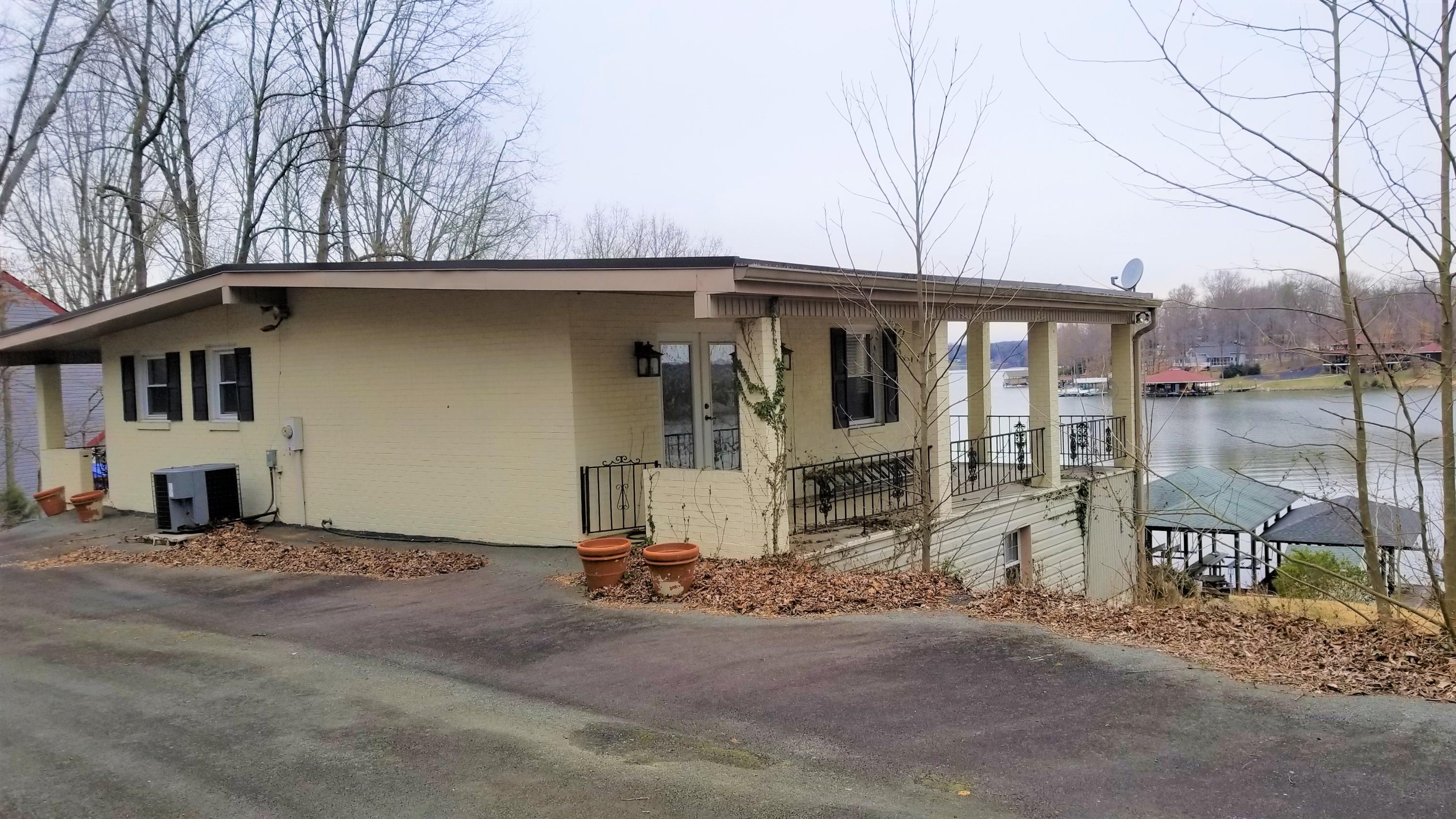 541 Highland Lake Road Union Hall, VA 24176 - Photo 35 of 37 a view of a house with a patio