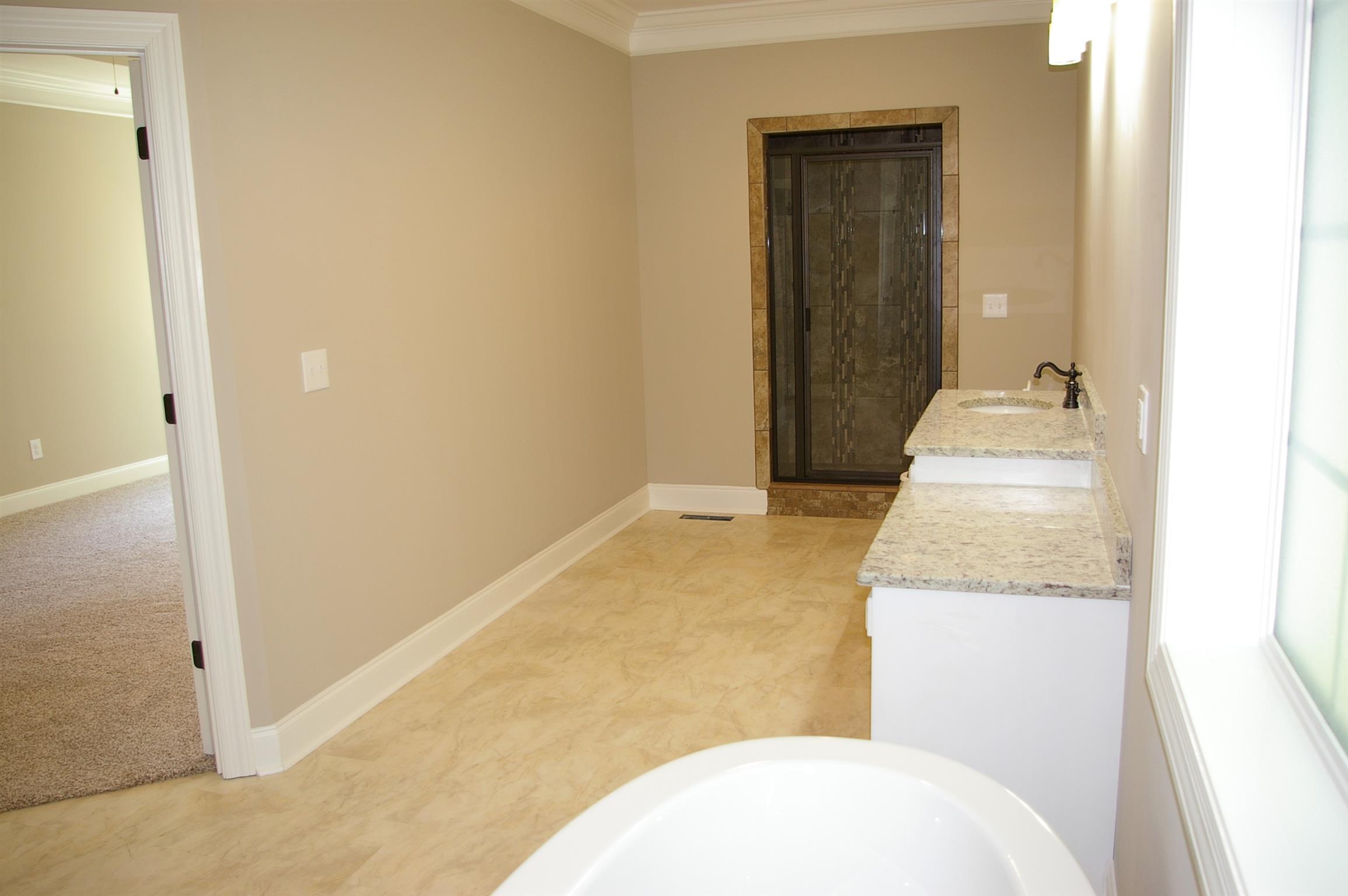 1 Sheltontown Road Manchester, TN 37355 - Photo 13 of 27 a bathroom with a granite countertop sink and a mirror