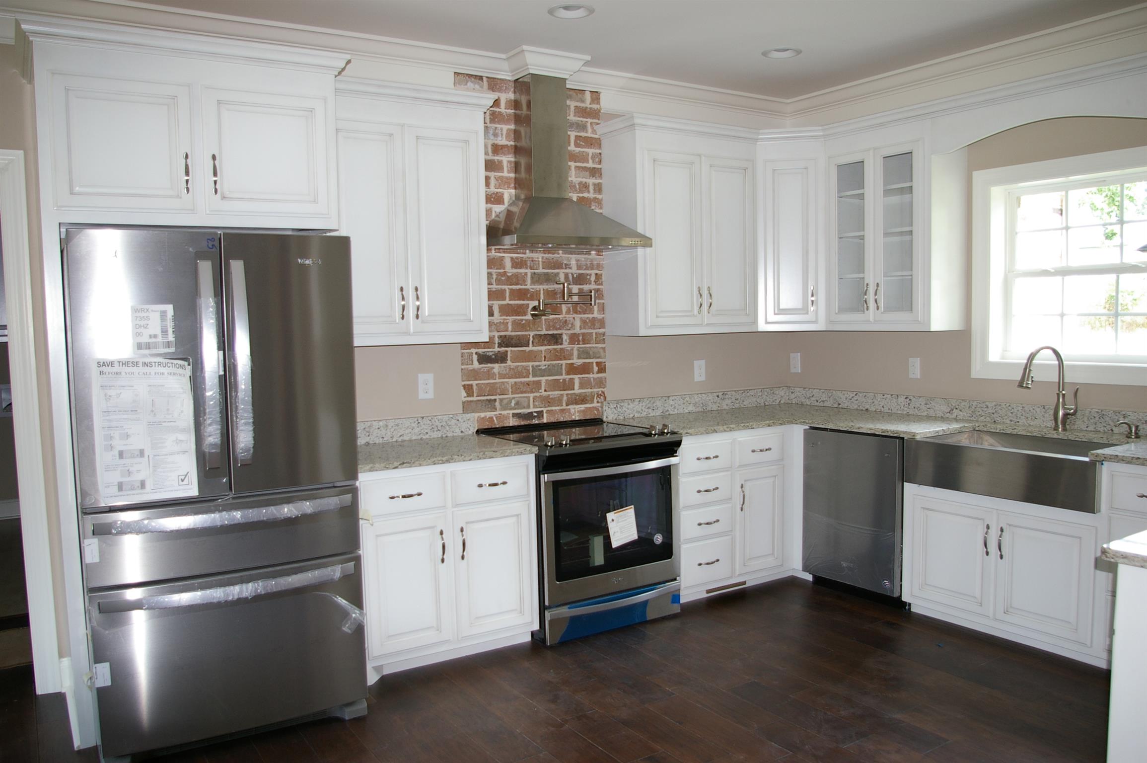 1 Sheltontown Road Manchester, TN 37355 - Photo 5 of 27 a kitchen with cabinets stainless steel appliances and a window