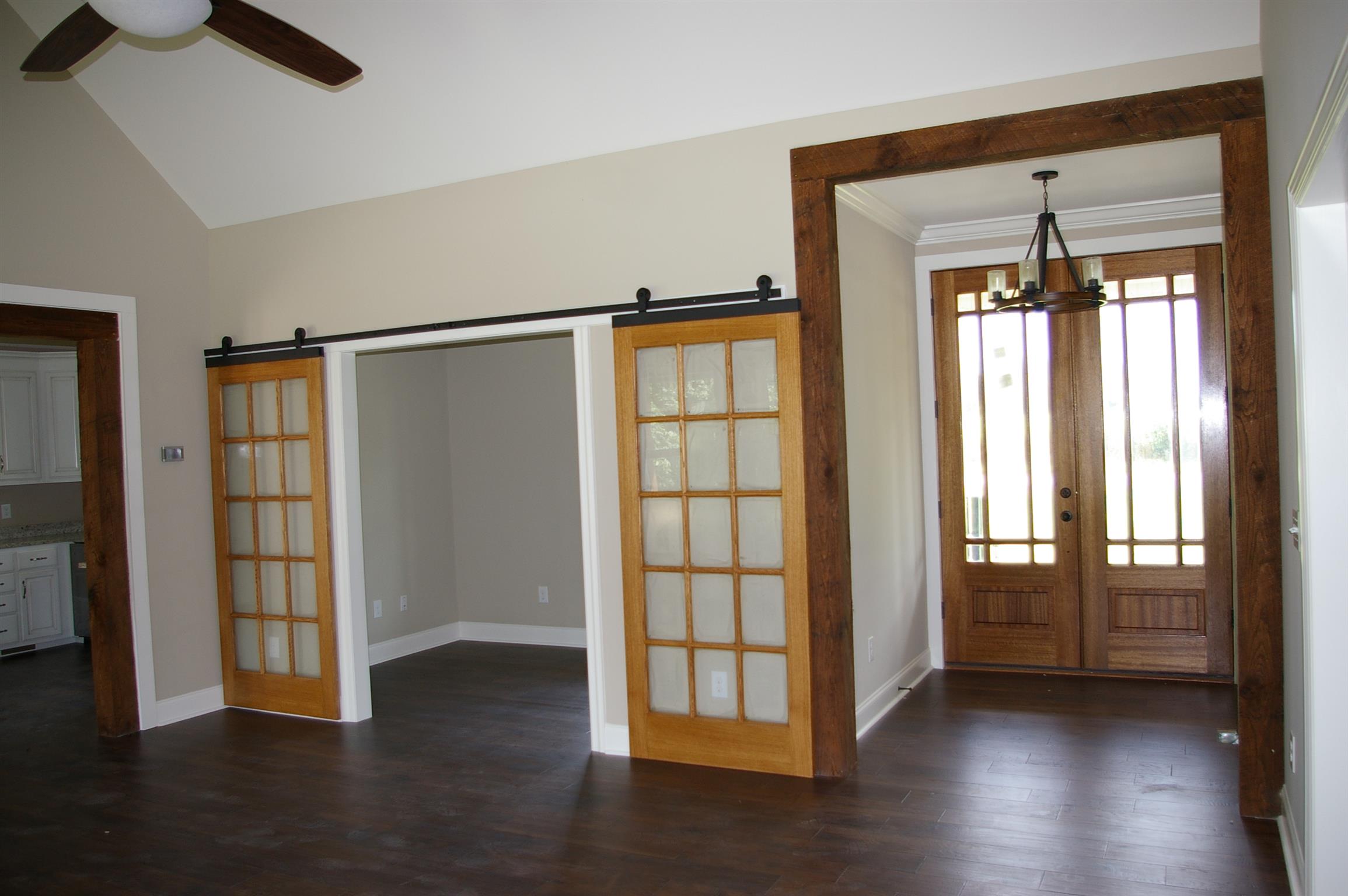1 Sheltontown Road Manchester, TN 37355 - Photo 8 of 27 a view of an empty room with wooden floor and a window