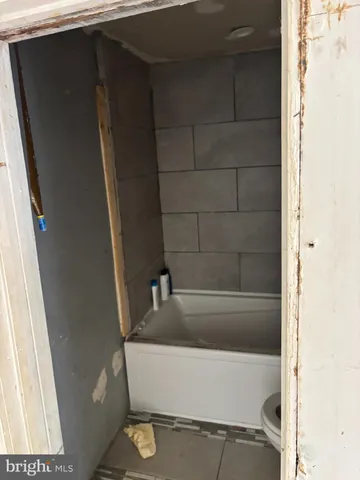 a bathroom with a bathtub