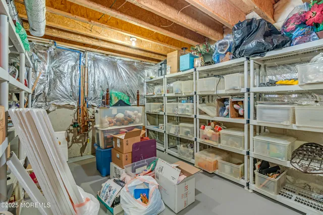 a front view of a house with a chairs and a table
