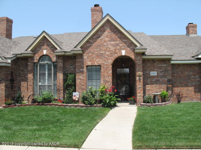 3509 West Point Drive Amarillo, TX 79121 - Photo 1 of 18 a front view of a house with a garden and plants