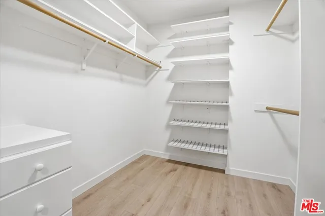 a view of a room with racks on the wall