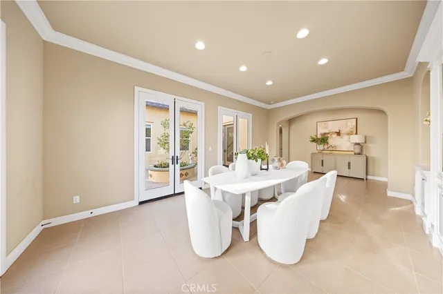 a kitchen with granite countertop a white stove and cabinets