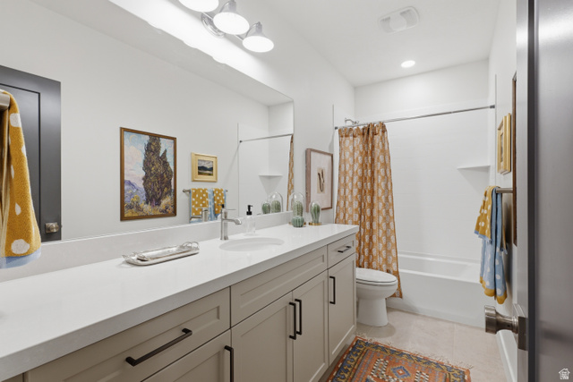2559 West Aurora Avenue Mapleton, UT 84664 - Photo 43 of 60 Bathroom featuring a single vanity with extensive countertop space, integrated sink, and matte black hardware