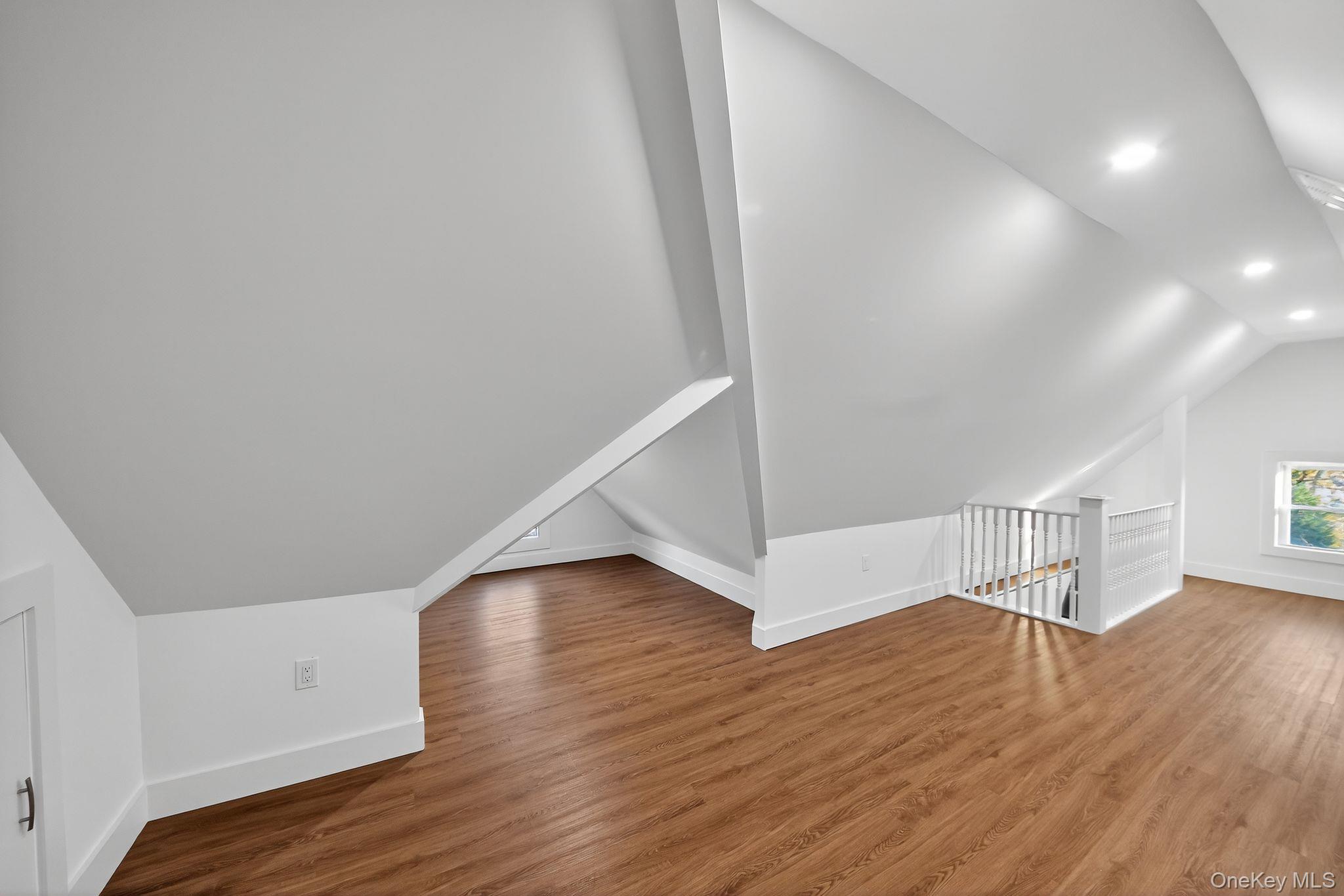 153 Franklin Avenue, Unit 2 Pearl River, NY 10965 - Photo 25 of 25 Bonus room featuring lofted ceiling, wood finished floors, and recessed lighting