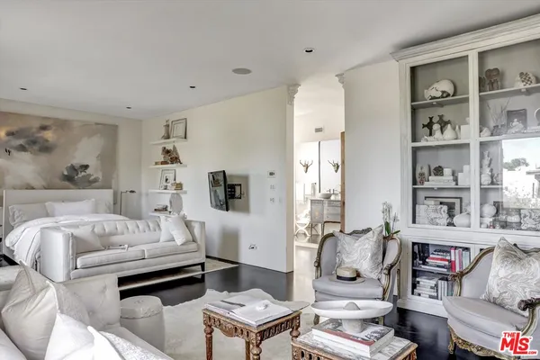 a bedroom with furniture and a couch