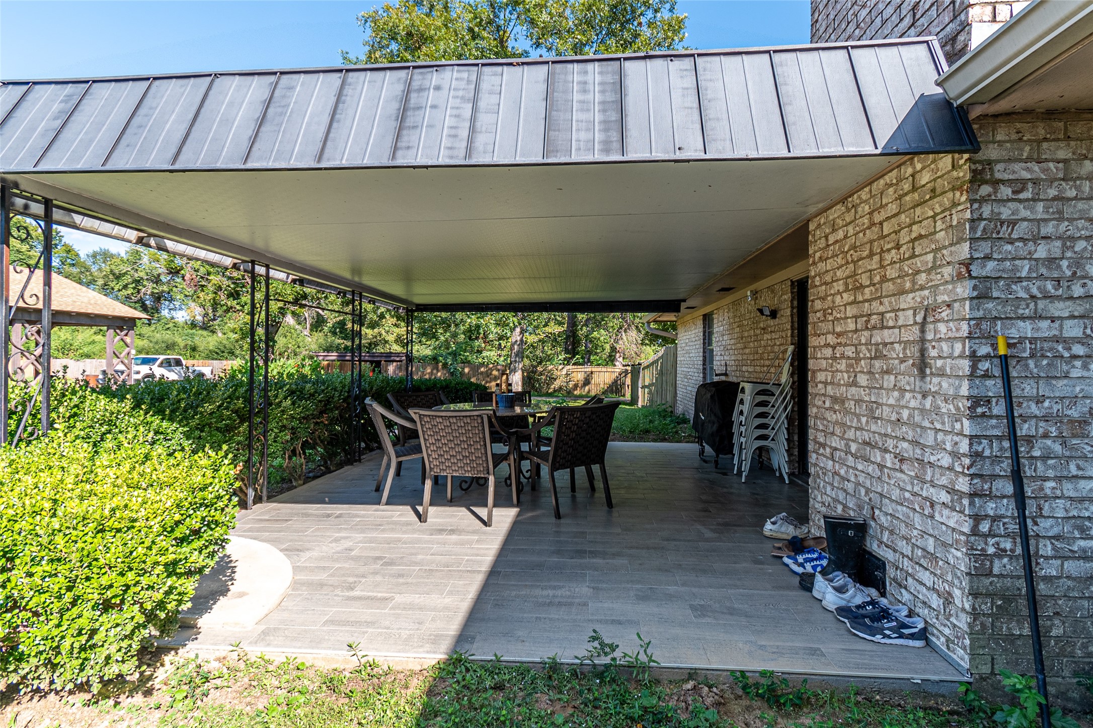 635 East Church Street Centerville, TX 75833 - Photo 22 of 33 a view of outdoor dining space with a table and chairs