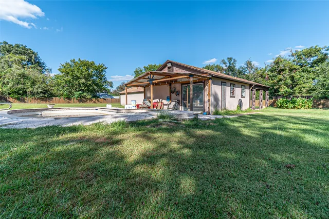 a view of a house with a big yard