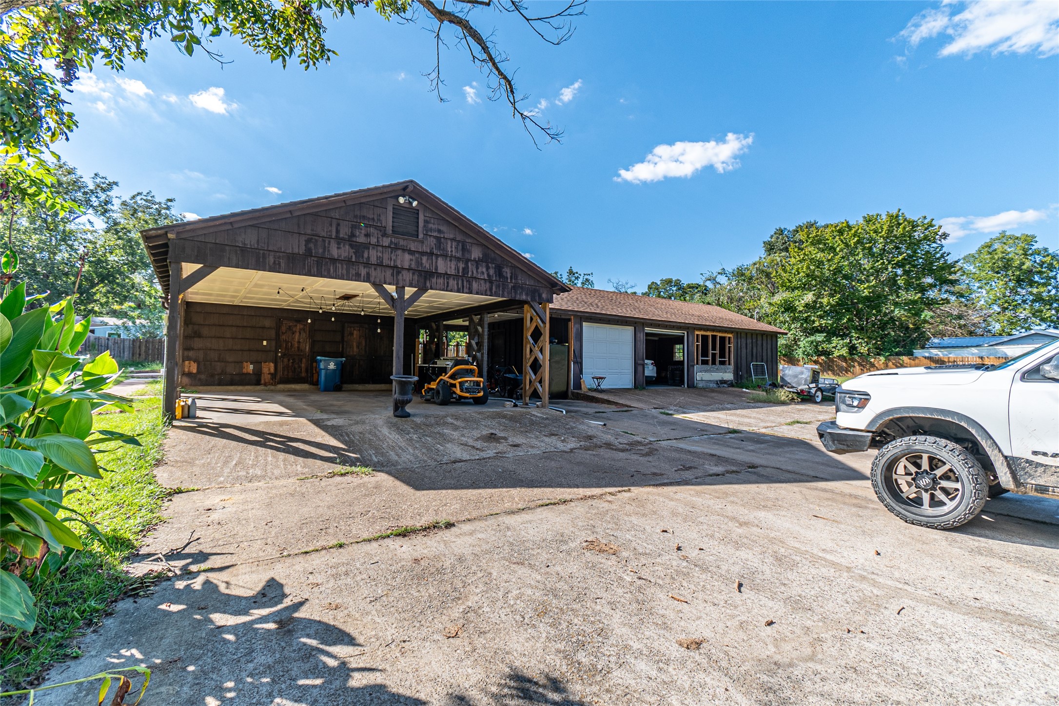 635 East Church Street Centerville, TX 75833 - Photo 28 of 33 a front view of a house with a yard and garage