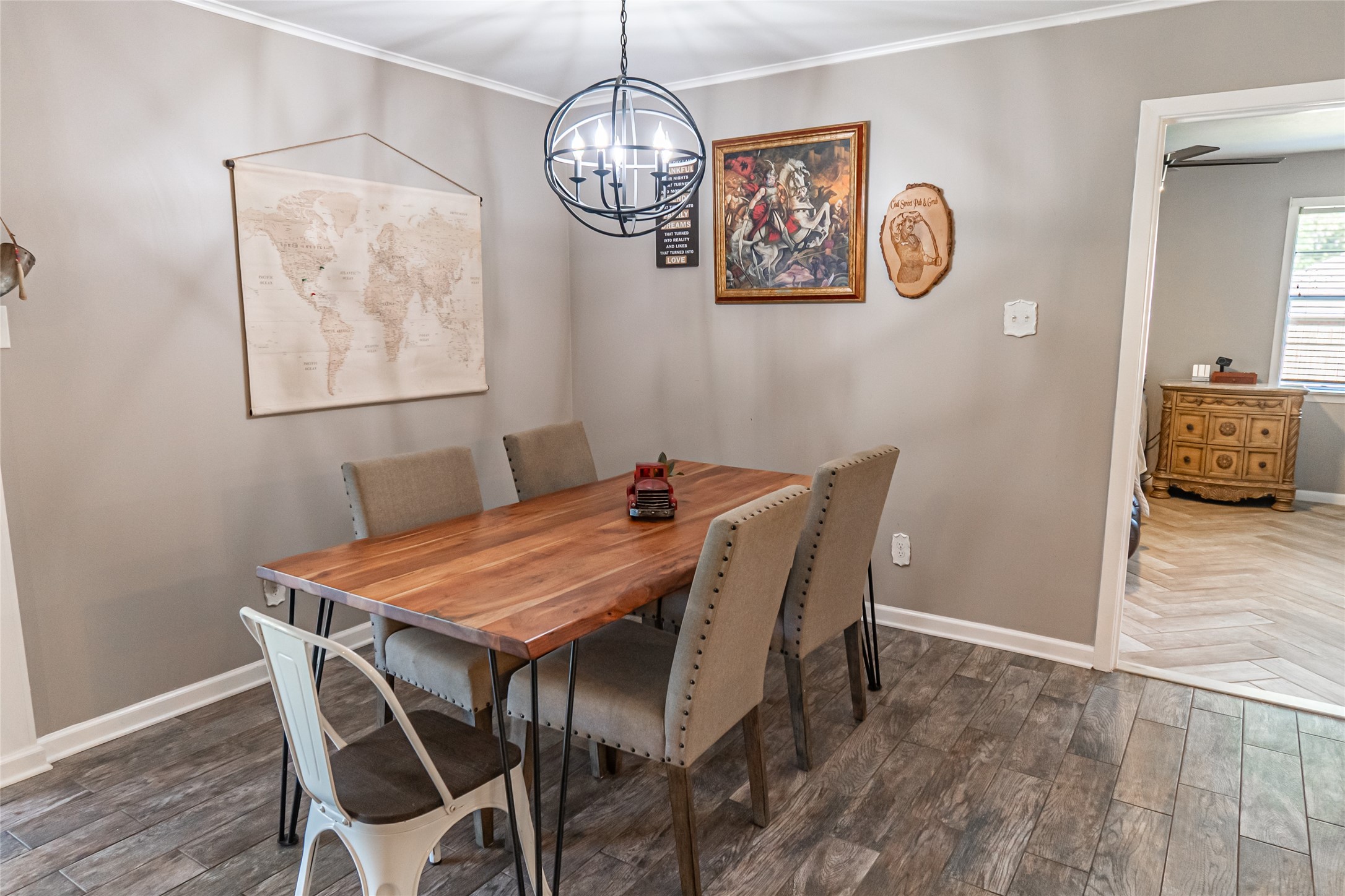635 East Church Street Centerville, TX 75833 - Photo 3 of 33 a view of a dining room with furniture wooden floor and a chandelier