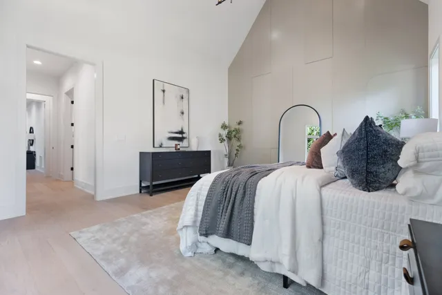 a bedroom with a bed and closet