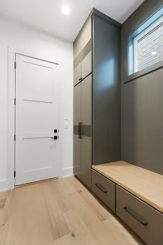 a bathroom with a tub and a shower