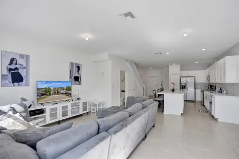 a view of a backyard with a swing