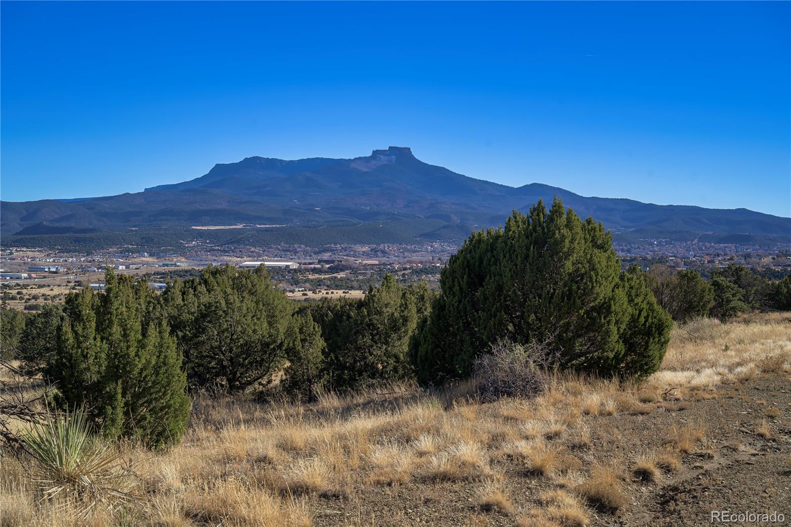 15311 Rancho Verde Road Trinidad, CO 81082 - Photo 5 of 40 a view of a house with a mountain