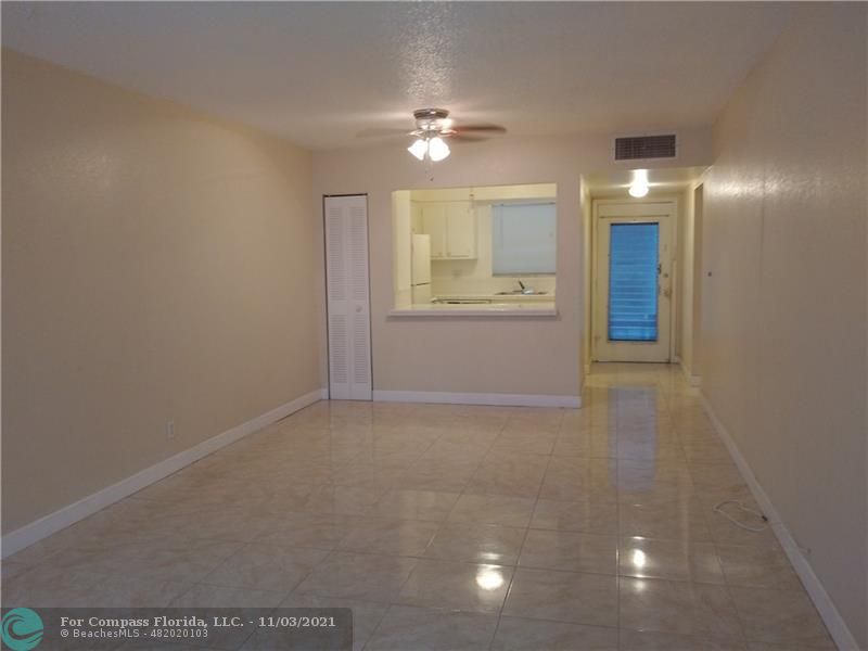6501 Winfield Boulevard, Unit A11A Margate, FL 33063 - Photo 3 of 10 a view of an empty room with a bathroom