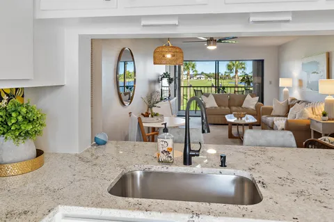 a living room with a couch and a table