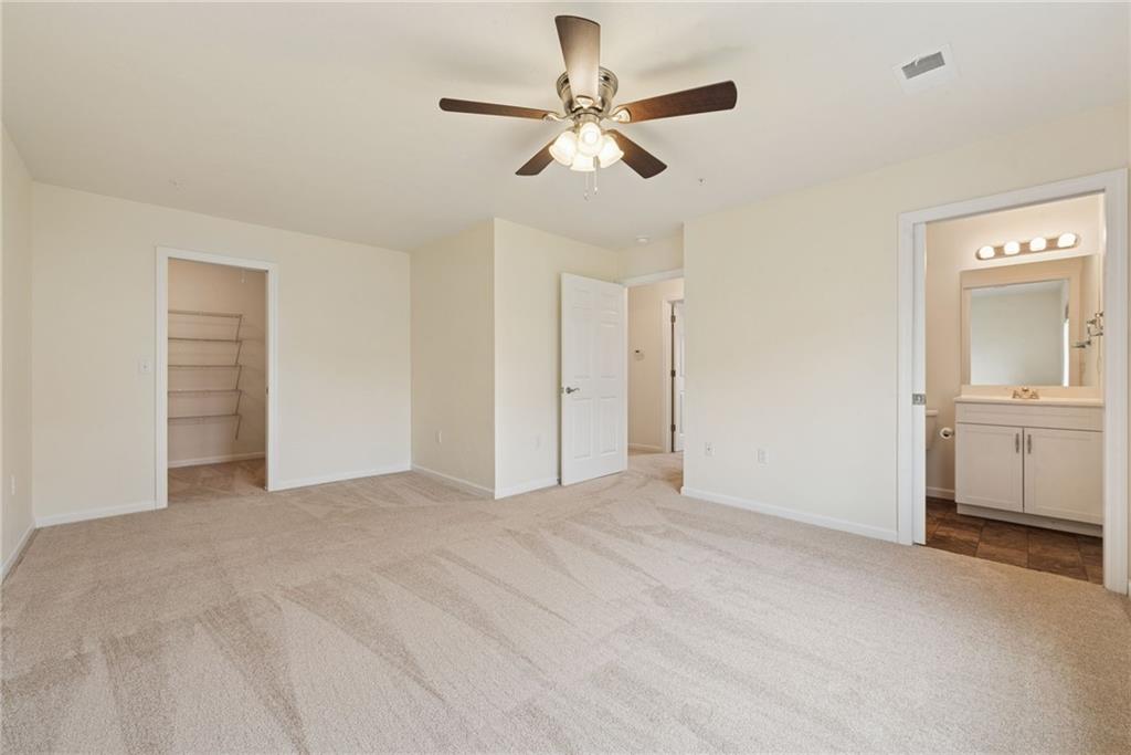 498 Sunview Circle Latrobe, PA 15650 - Photo 12 of 28 a view of a livingroom with a ceiling fan and window