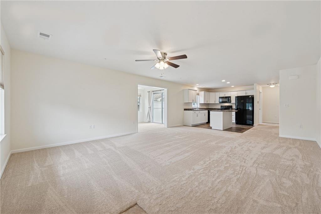 498 Sunview Circle Latrobe, PA 15650 - Photo 2 of 28 a view of a kitchen with a sink and a ceiling fan