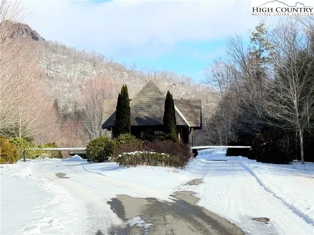 a view of a backyard of the house
