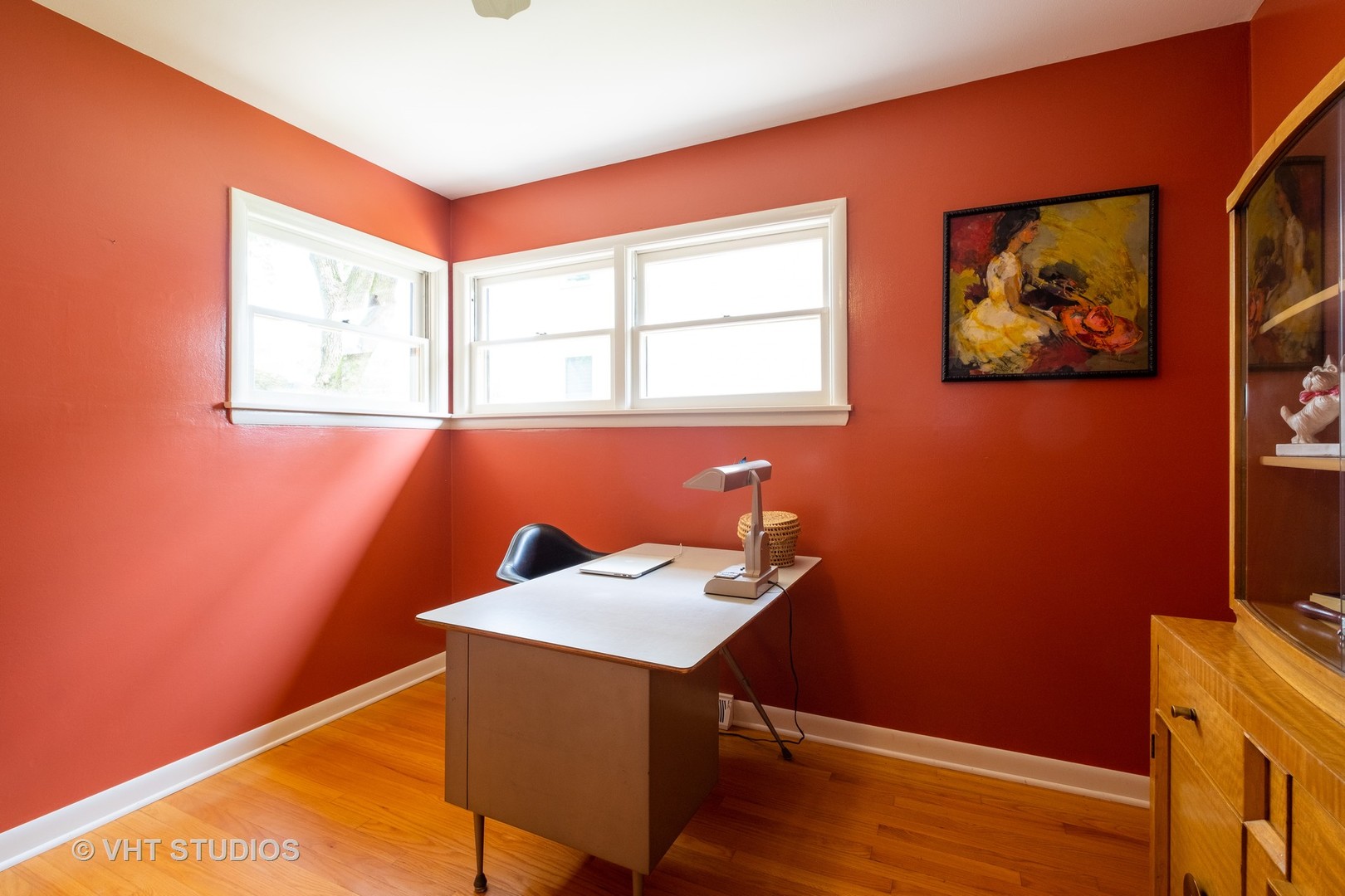 473 Ridge Road Highland Park, IL 60035 - Photo 8 of 17 a view of a workspace with furniture and wooden floor