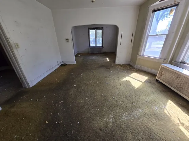 an empty room with windows