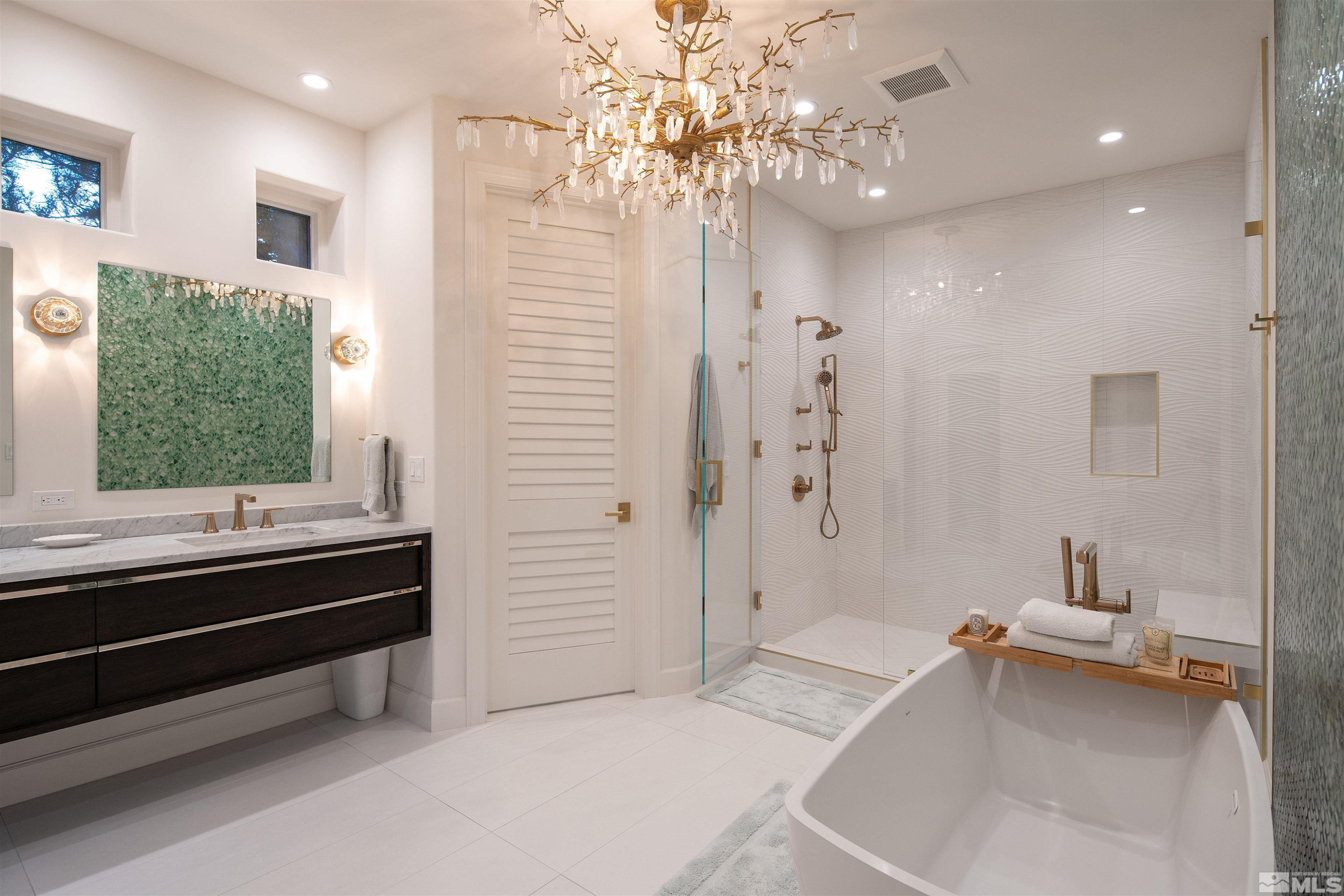 4305 Juniper Trail Reno, NV 89519 - Photo 11 of 30 a spacious bathroom with a bathtub and a sink